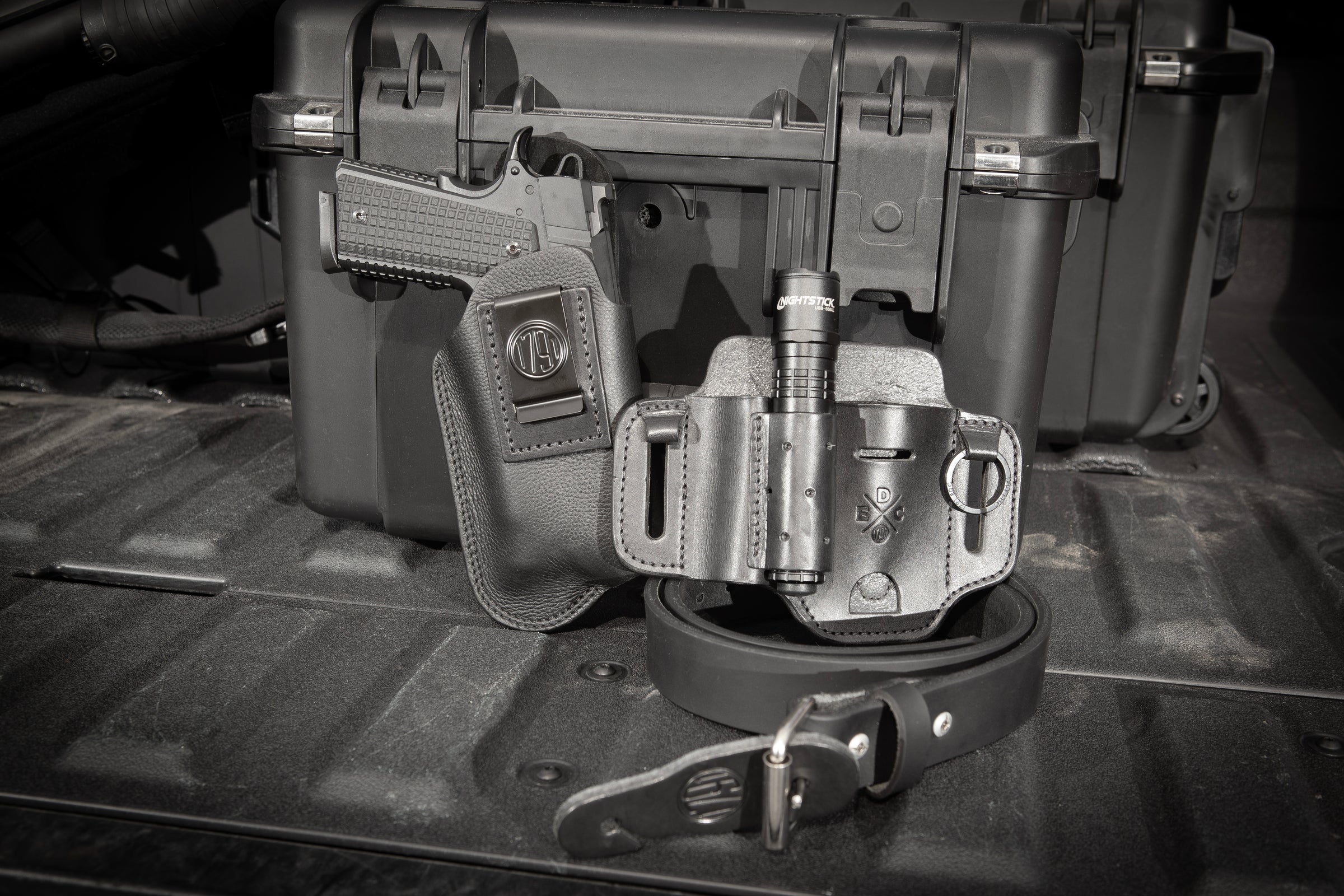 Gun_Tac_In Holster.jpg__PID:25b8c0da-05b5-45a1-83d6-3f7aa5910612