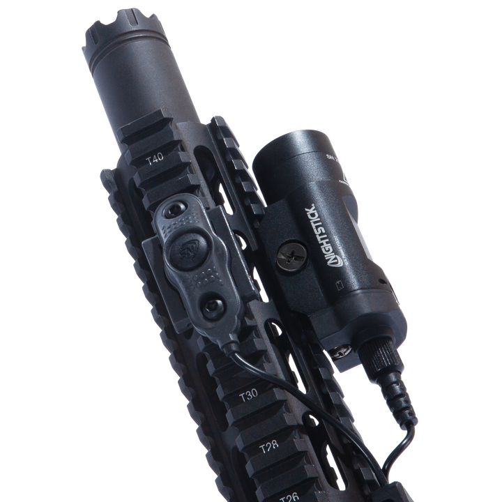 Black tactical flashlight with multiple buttons and a brand logo on a white background