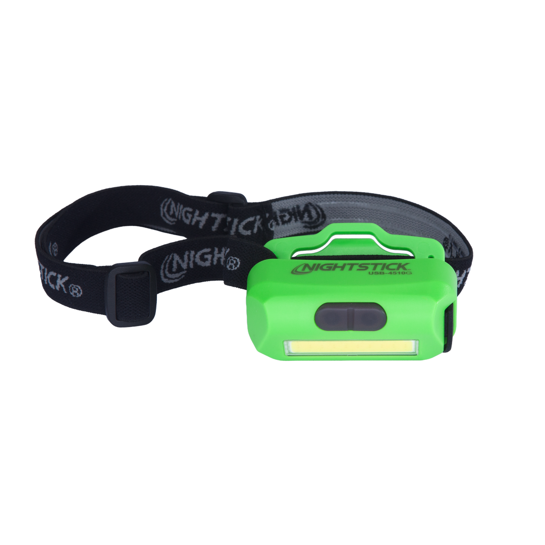 Green headlamp with black strap on a white background