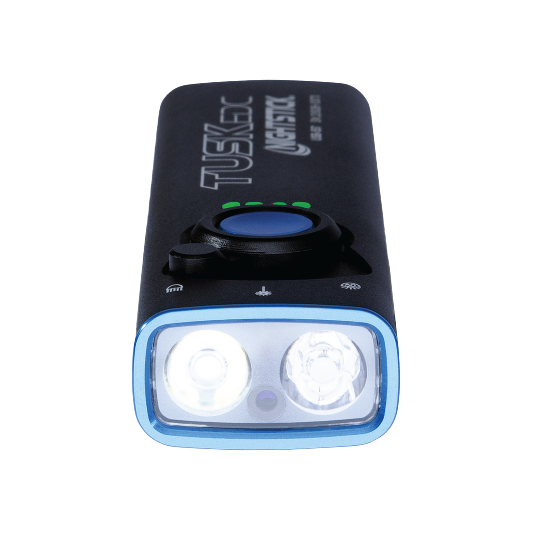 Black and blue headlight with visible branding on a white background