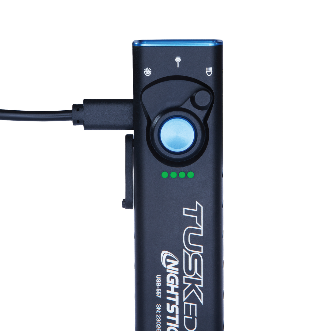 Black electronic device with blue light and 'Tusked Nightstick' branding on a white background